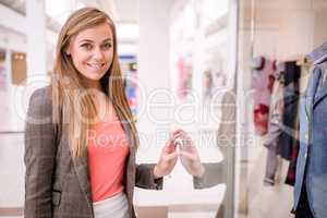 Portrait of beautiful woman window shopping
