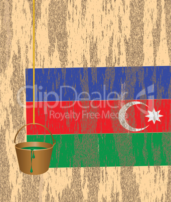 Azerbaijani flag on the wall of a ruined house