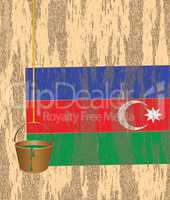 Azerbaijani flag on the wall of a ruined house