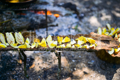 Sliced mushrooms are dried in the open air in the campaign
