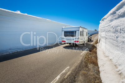 Caravan car travels on the highway.