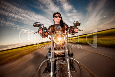 Biker girl on a motorcycle