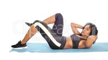 African American woman doing exercises.