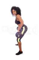 African American woman lifting weight .