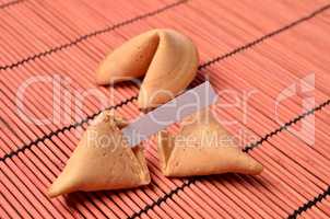 Fortune cookies on a bamboo mat