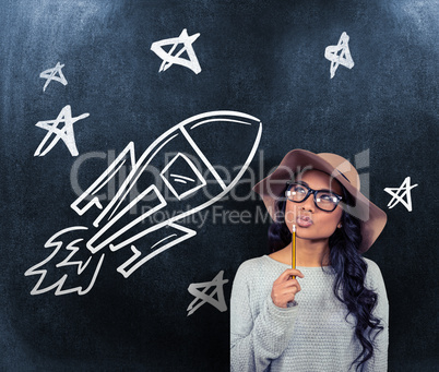 Composite image of asian woman holding pencil