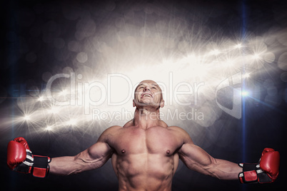 Composite image of boxer with arms outstretched