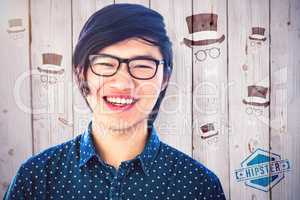 Composite image of smiling hipster businessman looking at camera