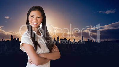 Composite image of casual businesswoman looking at camera with a