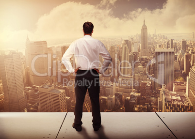 Composite image of rear view of classy young businessman posing