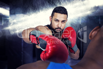 Composite image of boxing coach with his fighter