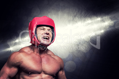 Composite image of angry boxer with headgear