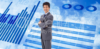 Composite image of portrait of a smiling businessman with the ar