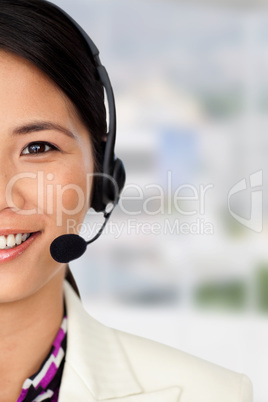 Composite image of radiant businesswoman using binoculars