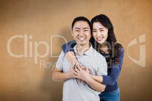 Composite image of portrait of cheerful couple