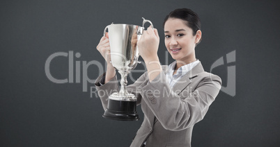 Composite image of portrait of a businesswoman holding a cup