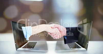 Composite image of close up of a business people closing a deal