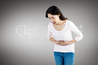 Young woman with stomach pain