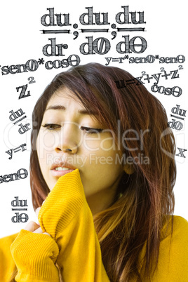 Composite image of beautiful woman looking away in park