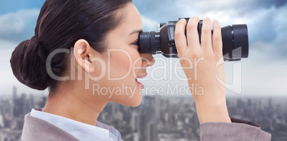 Composite image of side view of a businesswoman looking through