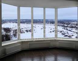 wide window of verandah with winter landscape