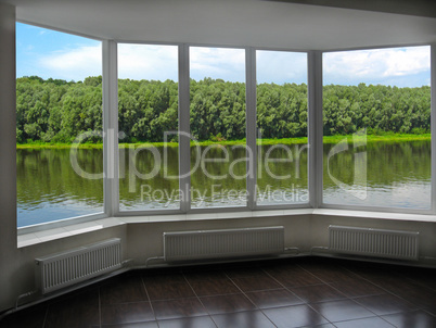 modern window of veranda overlooking the river