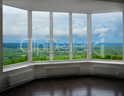modern window of veranda with thundercloud landscape