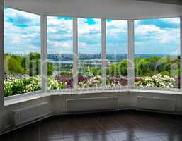 plastic window with view of Kyiv in spring