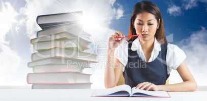 Composite image of thoughtful businesswoman reading
