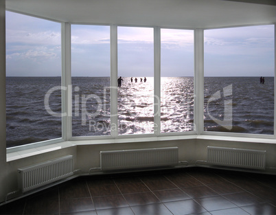 plastic window with view of evening lake Sivash