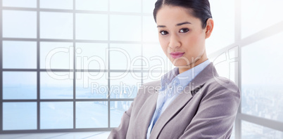 Composite image of portrait of a gorgeous businesswoman posing w