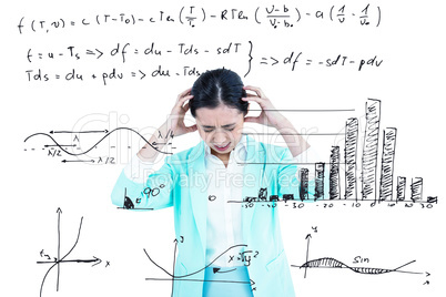 Composite image of worried businesswoman holding her head Composite image of worried businesswoman holding her head