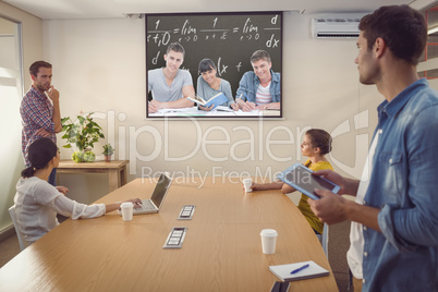 Composite image of students doing work together as they all look