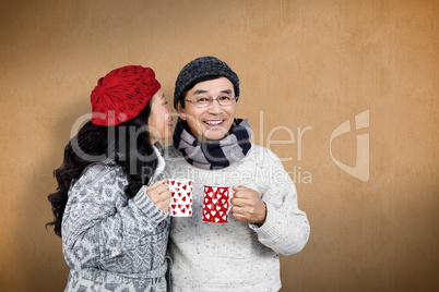 Composite image of older asian couple having hot drinks