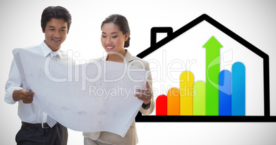 Composite image of estate agent looking at blueprint with potent