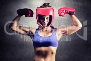 Composite image of portrait of confident female fighter flexing