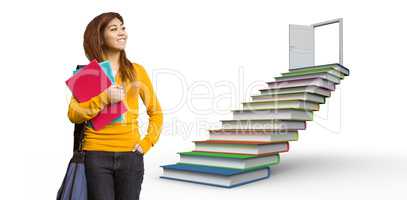 Composite image of female college student with books in park
