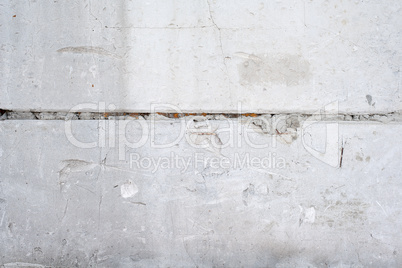 Texture background of a white wall with small cracks