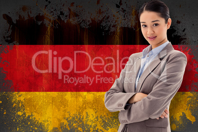 Composite image of portrait of a beautiful businesswoman posing