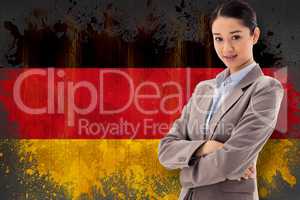 Composite image of portrait of a beautiful businesswoman posing