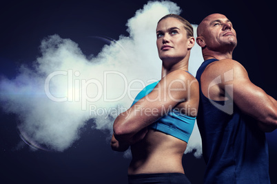 Composite image of low angle view of muscular man and woman