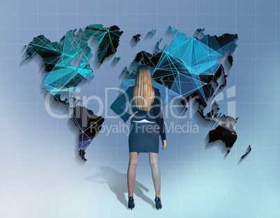 Girl stands in front of the network world map