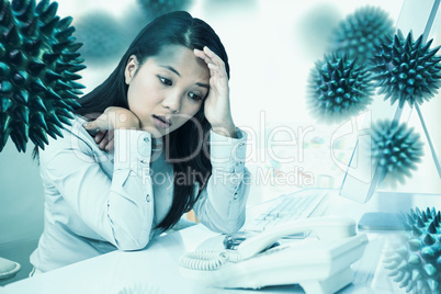 Composite image of unsmiling businesswoman with hands on face