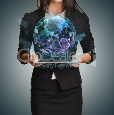 Young girl holding tablet in the hands of virtual digital globe