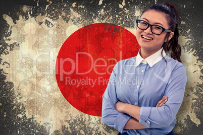 Composite image of asian woman with arms crossed
