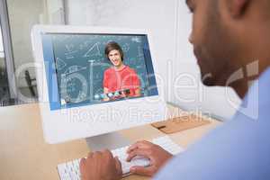Composite image of smiling student with tablet