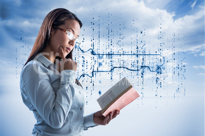 Composite image of concentrated businesswoman reading book