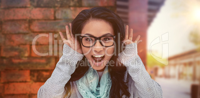 Composite image of asian woman shouting to the camera