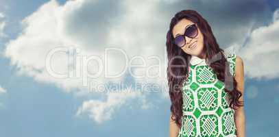 Composite image of asian woman with sunglasses posing for camera