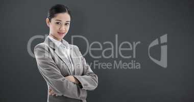 Composite image of portrait of a beautiful businesswoman posing